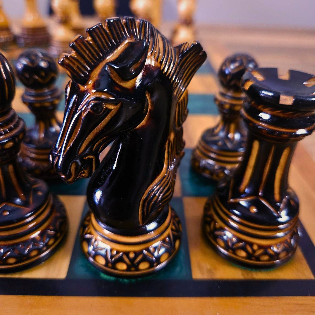 Detailed handcrafted luxury chess pieces with artisan detailing